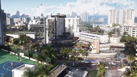 white hotels, palm trees and a busy beach road under a bright sky in Vice City in a Rockstar Games screenshot for GTA 6