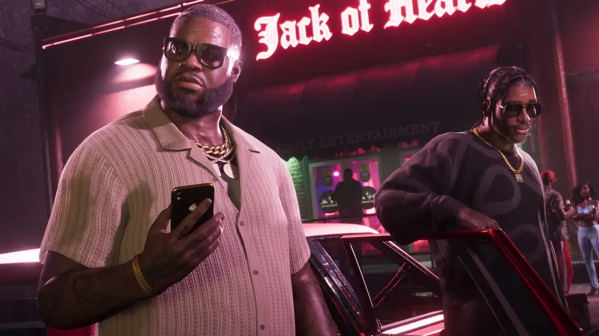 a man in gold chains holding a phone outside a neon lit club at night in a Rockstar Games image for GTA 6